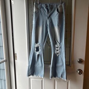 Distressed Light Blue Flared Jeans